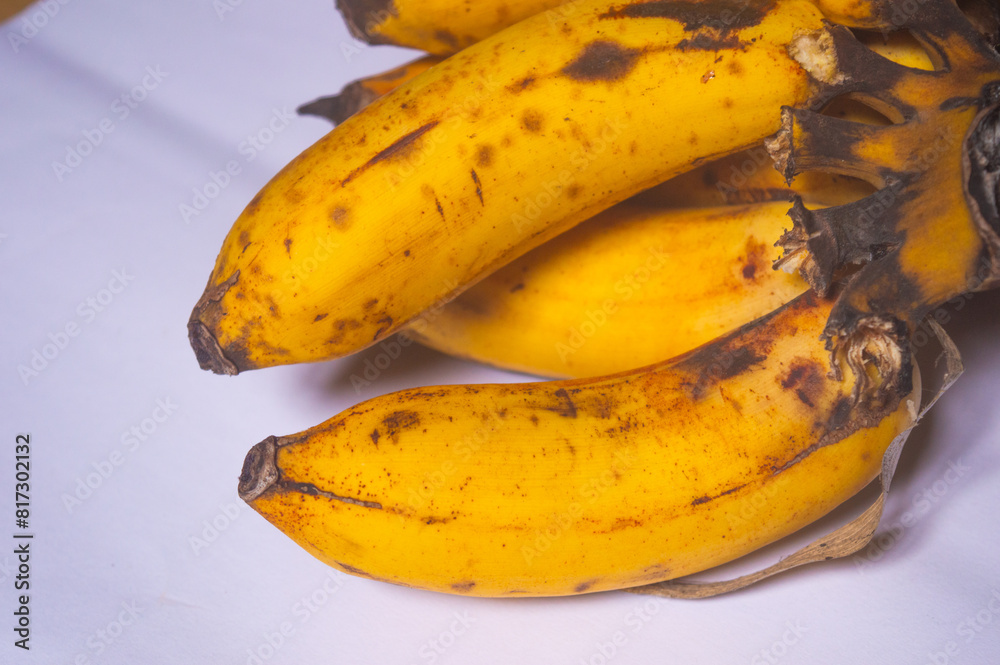 close up of banana fruit isolated on a white background close up of banana fruit isolated on a white background