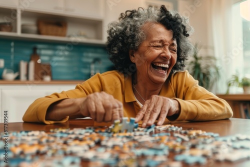 Cheerful elderly woman enjoying a jigsaw puzzle, laughing heartily in a casual indoor setting