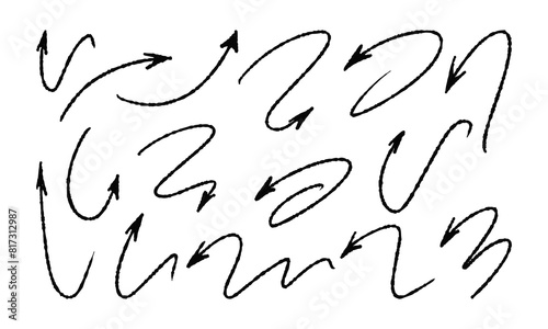 Fifteen curved handwritten arrows drawn in charcoal or soft pencil. Set of vector doodles and squiggles