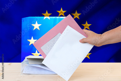 European election, female hand voter with ballot paper, transparent ballot box, political parties, voting rights, civic duty, citizen participation