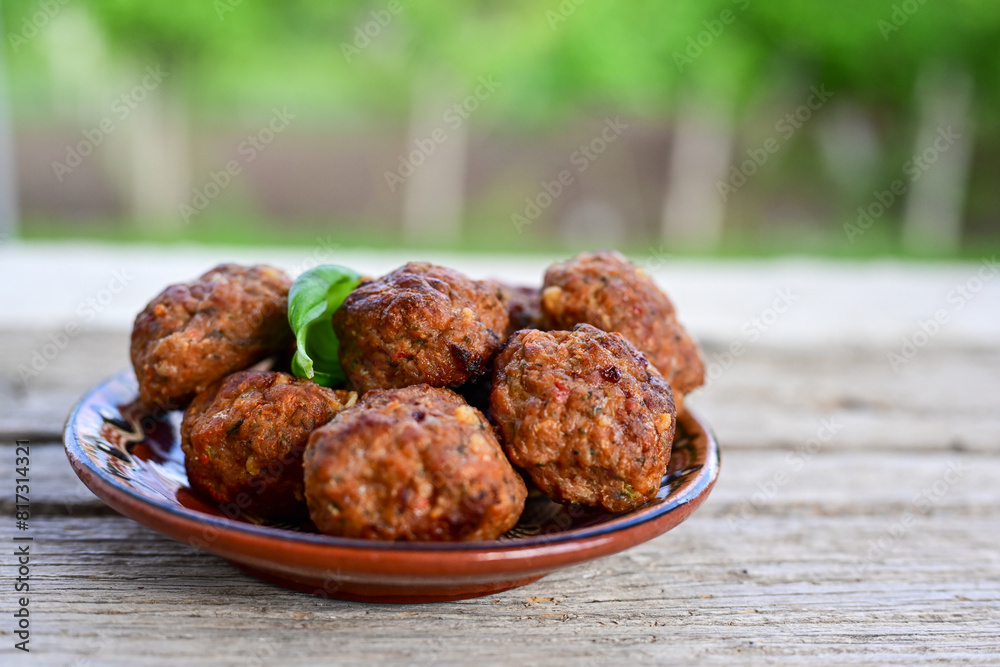 Home made Fried  pork meatballs  outdoor on wooden rustic background