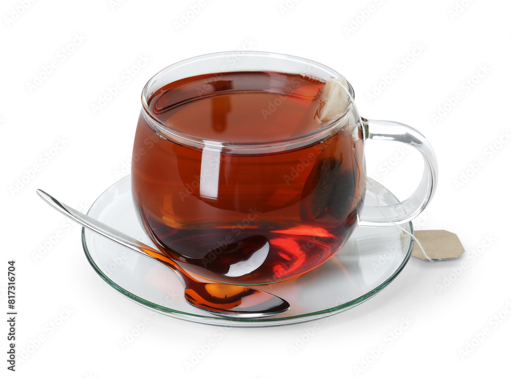 Brewing aromatic tea. Cup with teabag and spoon isolated on white Brewing aromatic tea. Cup with teabag and spoon isolated on white
