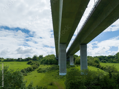 M50 motorway bridge in dublin from underside with concrete support pillars