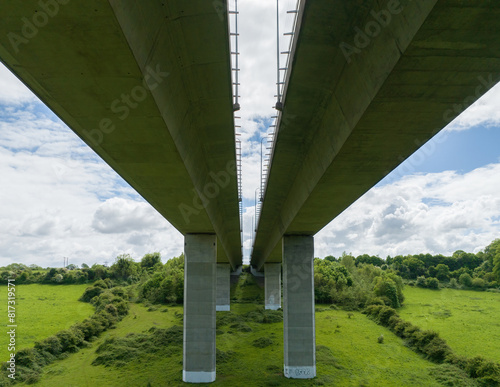 M50 motorway bridge in dublin from underside with concrete support pillars