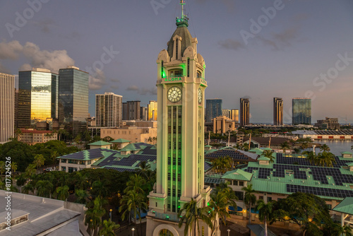 Exposure of the Aloha Tower at sunset, located on the Honolulu Harbor in Downtown Honolulu, about 15 minutes west of Waikiki, Aloha Tower is an iconic symbol of Hawaii. photo