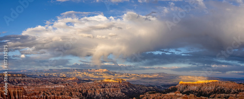 Panoramic view of Bryce Canyon amphitheatre in golden light at sunset from viewpoint in Bryce Canyon National Park, Utah, USA on 24 April 2024