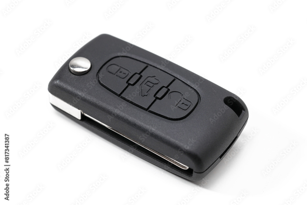 Modern car key with remote control lock isolated on white Modern car key with remote control lock isolated on white