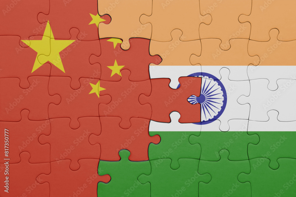 puzzle with the colourful national flag of india and flag of china ...