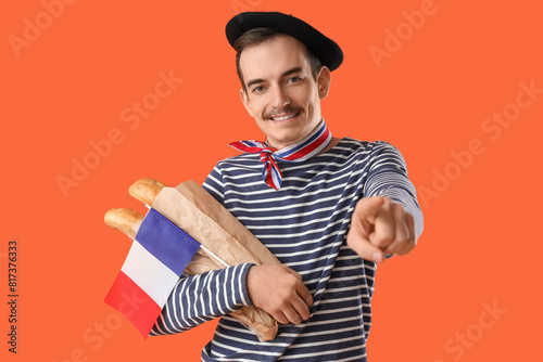 Handsome man with flag of F...