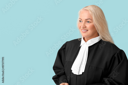 Mature female judge on blue...