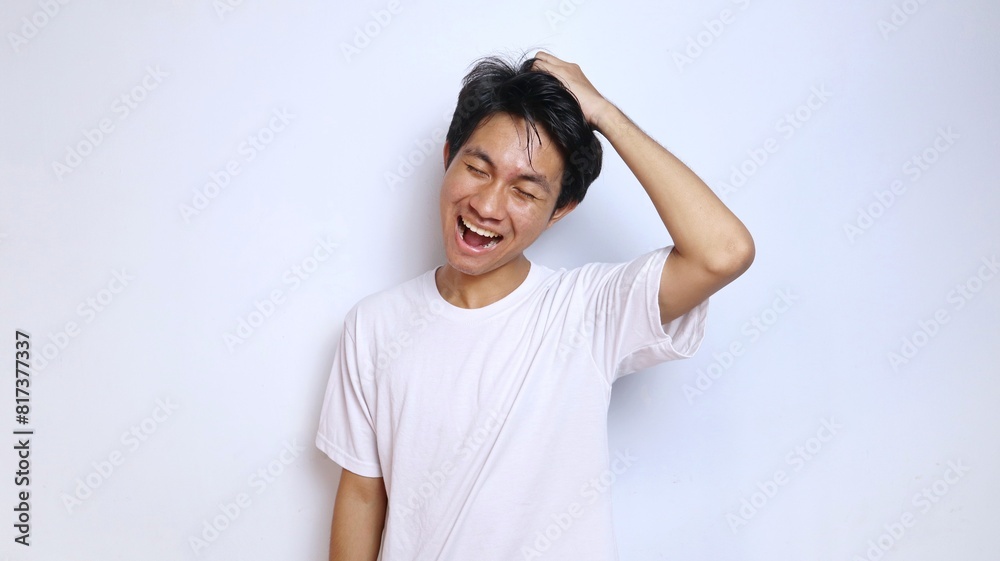 young asian man in white shirt funny expression laughing, happy young asian man in white shirt funny expression laughing, happy