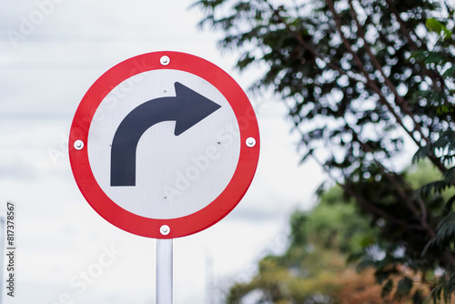 Traffic sign indicating right turn, rules of civility and mobility