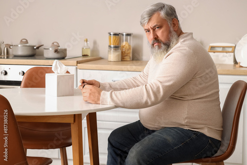 Portrait of sad senior man ...