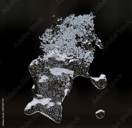 brilliant abstract ice like crystals formed on a window in winter photo