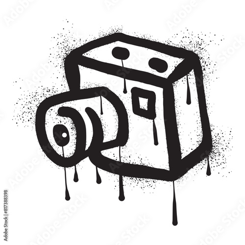 Camera with black spray paint graffiti art