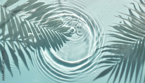 Beautiful water surface with tropical leaf shadow. Pure water background for cosmetic, spa product.