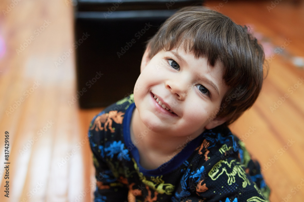 Expressive young boy in pajamas making faces Expressive young boy in pajamas making faces