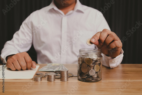 Businessman counting money money saving concept