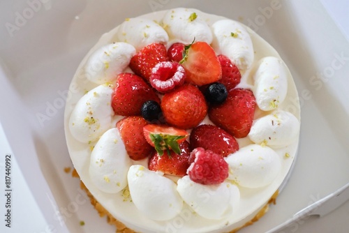 Photography A Japanese-style strawberry shortcake with fresh cream, strawberries, raspberrie
