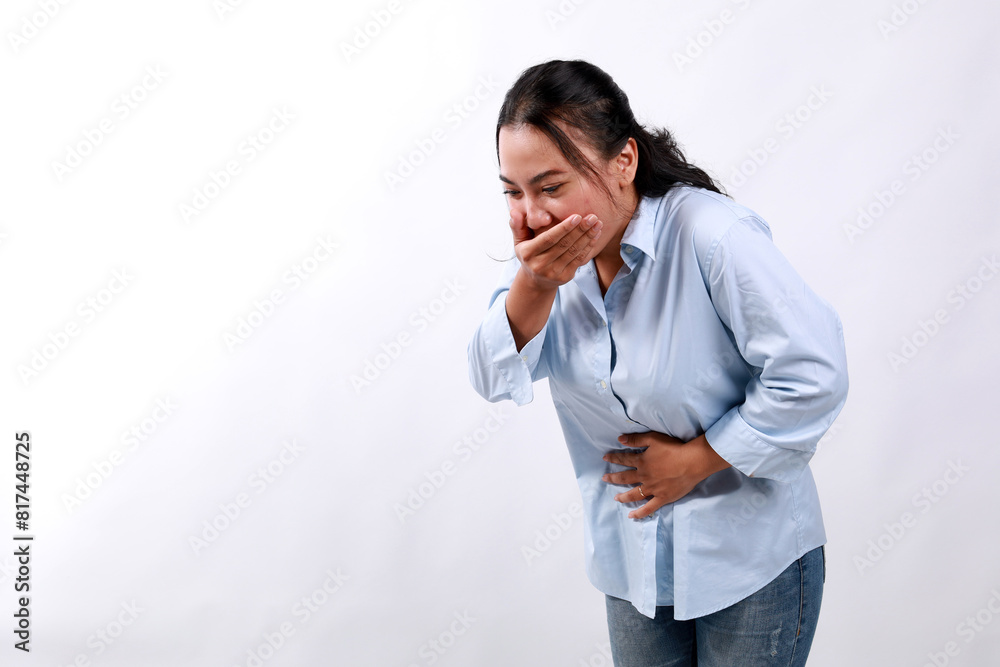 Asian Woman suffering from stomach ache and nausea on white background. Food poisoning Asian Woman suffering from stomach ache and nausea on white background. Food poisoning