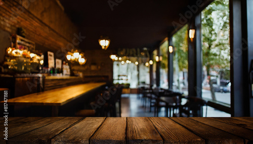  wood table on blur of cafe, coffee shop, bar, background - can used for display or montage