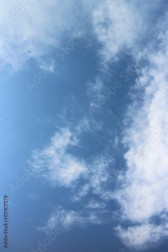 blue sky with white  soft clouds