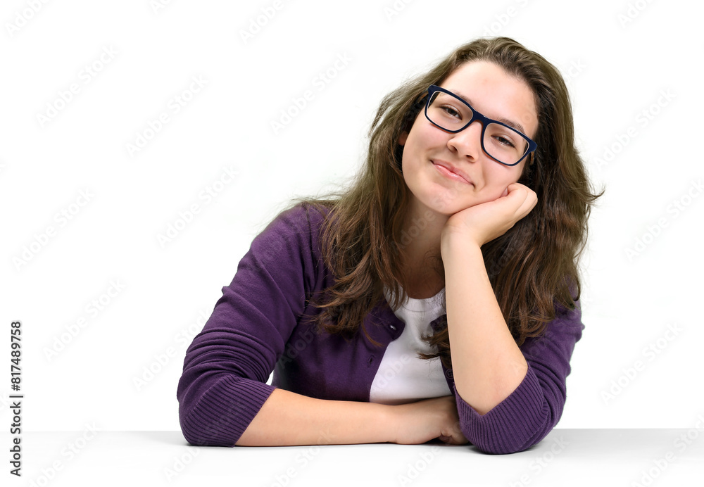 young and friendly teacher at her desk interacting the class young and friendly teacher at her desk interacting the class