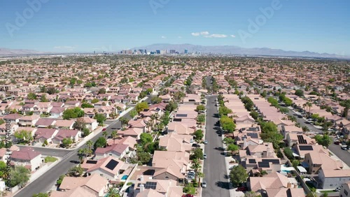Aerial shot of Las Vegas suburb with strip city casino skyline in background 17