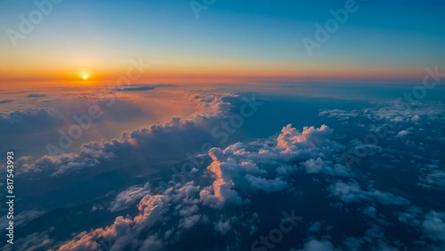view of sky and clouds - The view of the sky and the pattern of clouds during the flight  Golden Time  from the airplane window