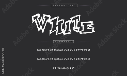 Black and white decorative font in graffiti style with spray effect. Ideal for pattern, fabric print, shops and many other uses