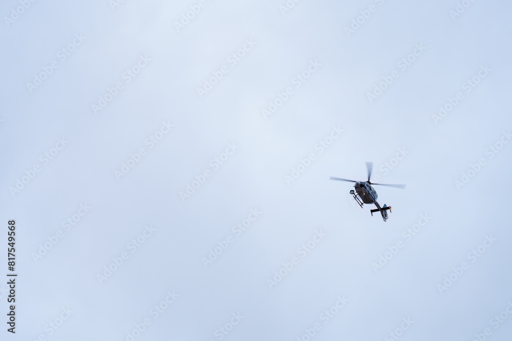 Police helicopter on the overcast sky. Police helicopter on the overcast sky.