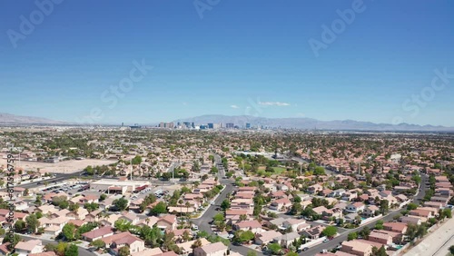 Aerial shot of Las Vegas suburb with strip city casino skyline in background 02