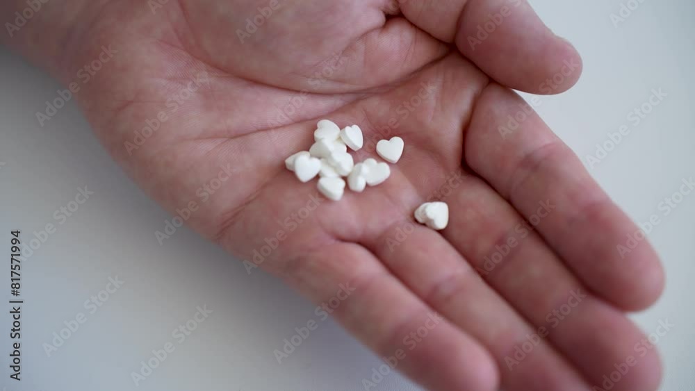 Close up senior man opening bottle of medication, pouring pills into hand Close up senior man opening bottle of medication, pouring pills into hand
