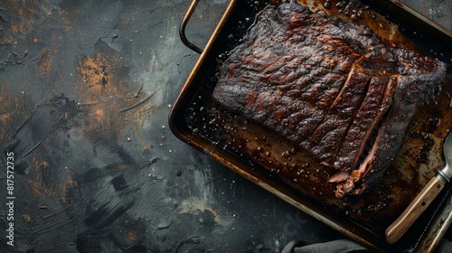 brisket on a pan with copy space. national brisket day background concept photo