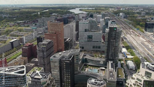 Aerial View Of Amsterdam's Zuidas (South Axis) Business District In The Netherlands. pullback shot photo