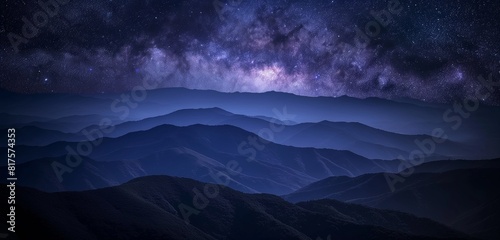 A series of mountain ridges at night, each layer progressively fading into the darkness, under a blanket of stars. 32k, full ultra HD, high resolution photo