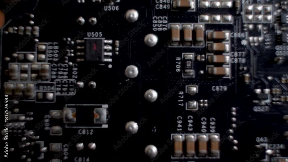 Macro Shot Of PCB Of Graphics Card Soldering Points. Dolly Left Macro Shot Of PCB Of Graphics Card Soldering Points. Dolly Left