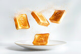 Crispy toasts jumping out of a toaster on plate on light background. Breakfast concept.