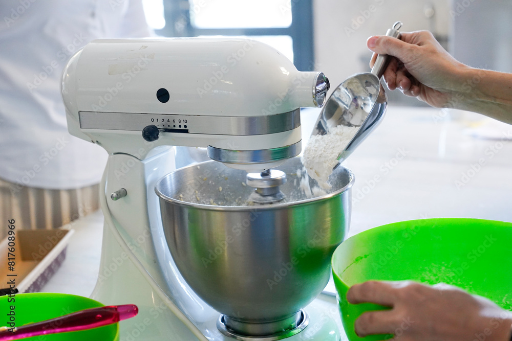 chef is preparing and baking dough