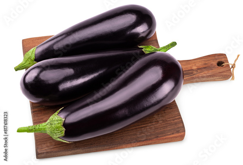 eggplants on rustic kithen wooden board isolated on white background. clipping path photo