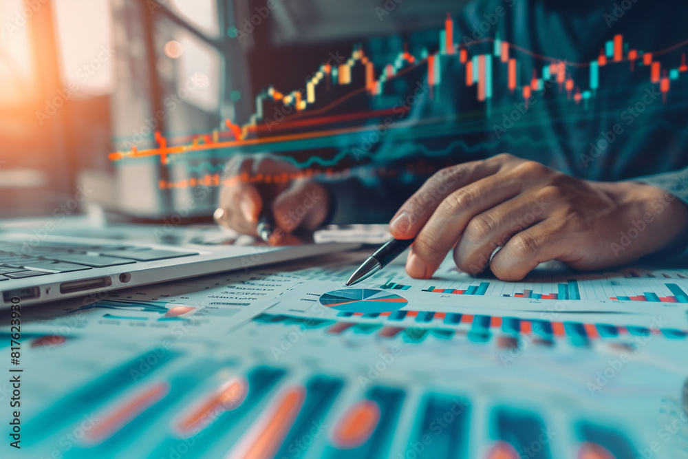 Business data and stock market analysis currency exchange. Businessman analyzing financial graph Business data and stock market analysis currency exchange. Businessman analyzing financial graph
