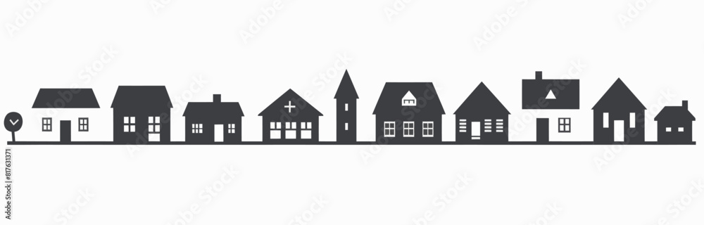 a black and white picture of a row of houses