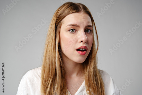 Young woman in a state of shock or surprise