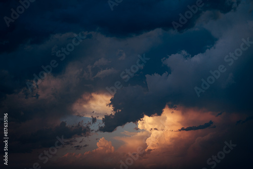 Dark blue and orange cloudy sky