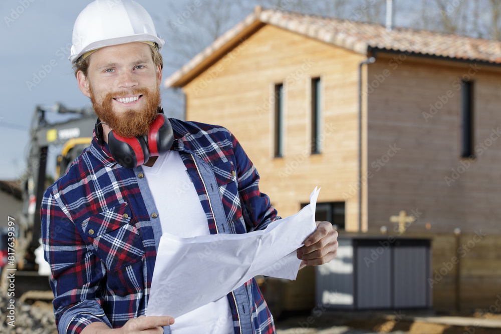 happy male worker making a work plan happy male worker making a work plan