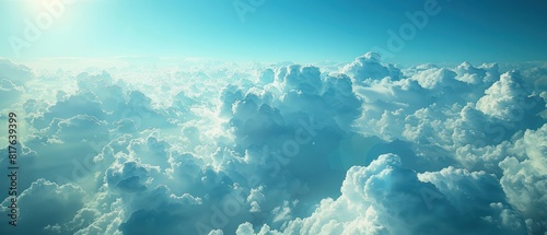 Describe the ethereal beauty of fluffy clouds drifting aimlessly across a deep blue sky