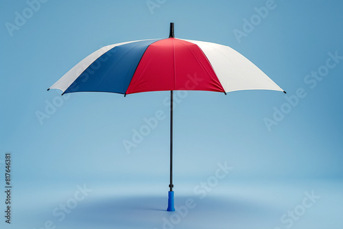 An inventive red  white  and blue umbrella open against a blue to white gradient background 