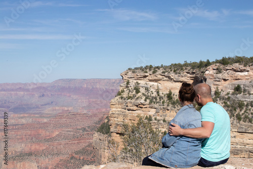 ouple embracing at scenic Grand Canyon viewpoint photo