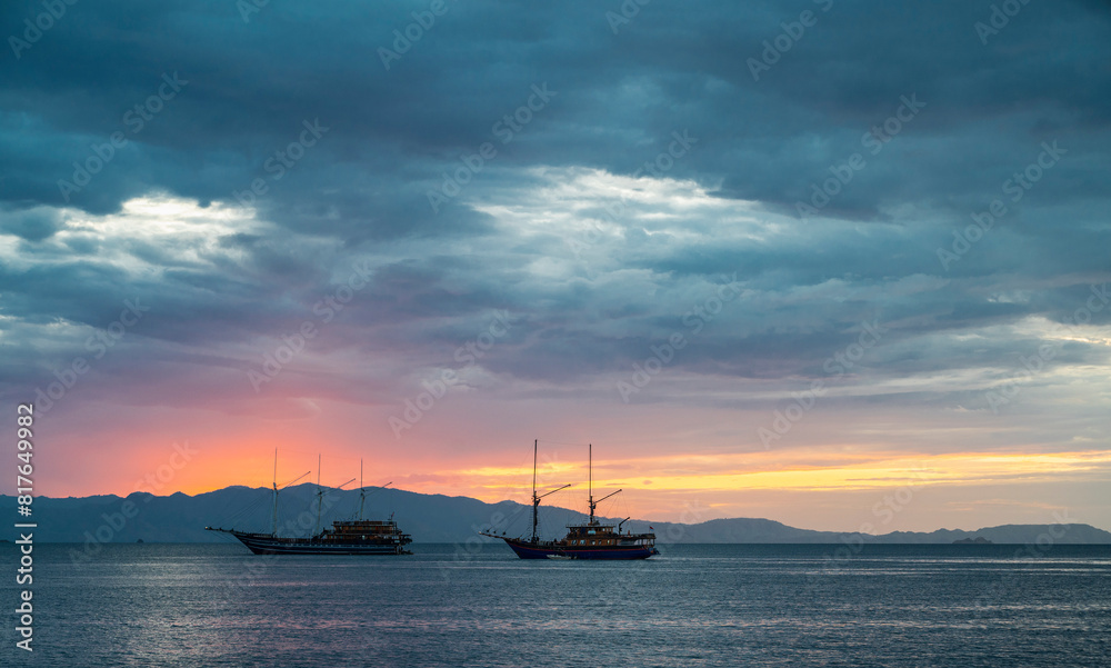 Sailboats anchored in Komodo - Indonesia Sailboats anchored in Komodo - Indonesia