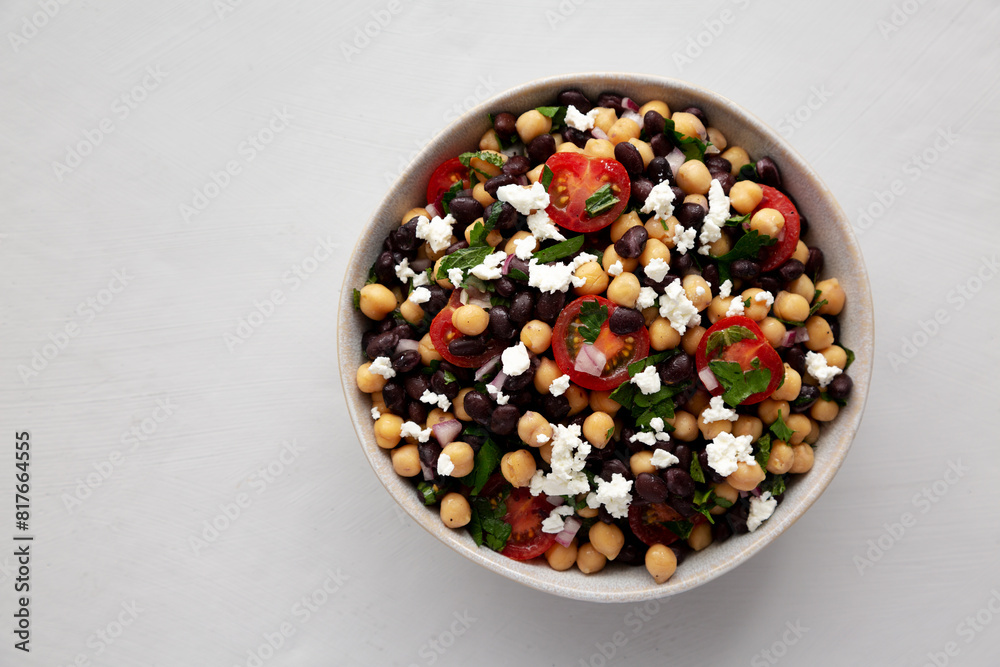 Homemade Chickpea And Black Bean Salad in a Bowl, top view. Copy space. Homemade Chickpea And Black Bean Salad in a Bowl, top view. Copy space.